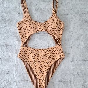 Reversible one piece animal print stripe swimsuit. Size L.